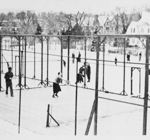 Winter activity at Fox Meadow in 1936 included paddle and ice-skating. Playing paddle are Fess Blanchard and his daughter Ruth (on the right) playing against Kitty Fuller and an unidentified partner.