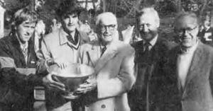 Kilmarx presents Championship Bowl to 1986 winners Hank Irvine and Greg Moore. Paul Molloy and Dick Warren are on the right